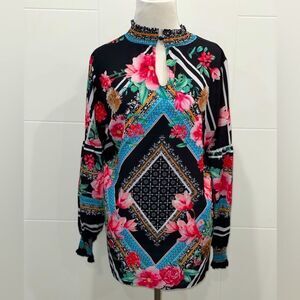 Long sleeve floral blouse with peep hole